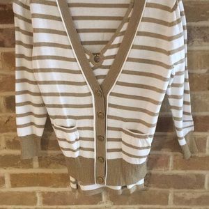 Ladies beautiful gold and white sweater set.